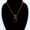 Photo of Radiant Night Wire Wrapped Blue Goldstone Necklace on a neck form