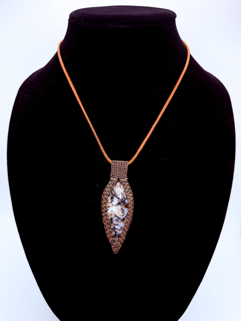 Photo of Enchanted Light Wire Wrapped Merlinite Necklace. on a neck form