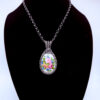 Photo of Vibrant Energy Wire Wrapped Agate and Moonstone Necklace on a neck form