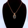 Photo of Angelic Light Wire Wrapped Seraphinite Necklace On A Neckform