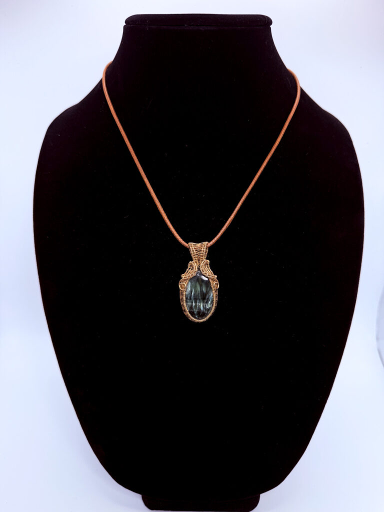 Angelic Light Wire Wrapped Seraphinite Necklace 2 Photo of Angelic Light Wire Wrapped Seraphinite Necklace On A Neckform