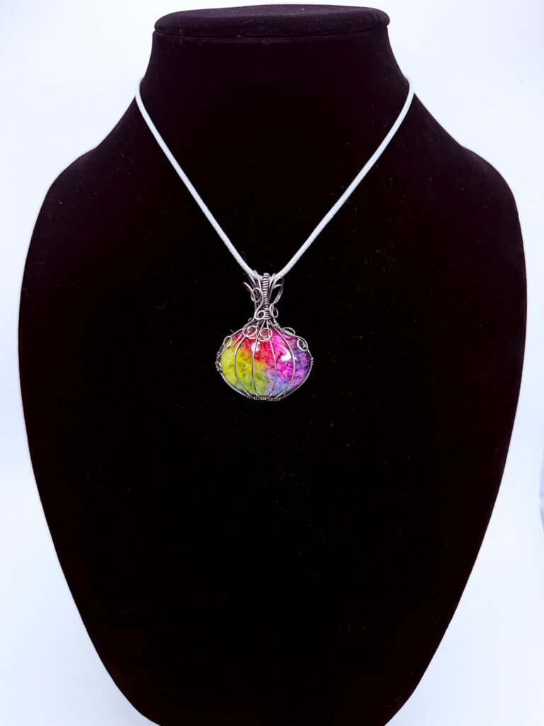 Photo of Bright Harmony Wire Wrapped Rainbow Quartz Necklace on a neck form