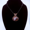 Photo of Vibrant Energy Wire Wrapped Agate and Moonstone Necklace on a neck form