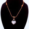 Photo of Pure Balance Wire Wrapped White Plume Agate Heart Necklace on a neck form