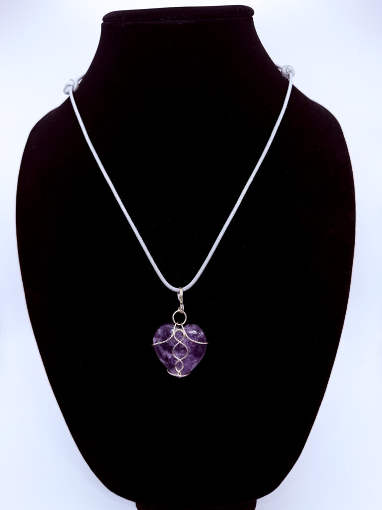 Divine Love Wire Wrapped Amethyst Heart Necklace 6 Photo of Divine Love Wire Wrapped Amethyst Heart Necklace on a neck form