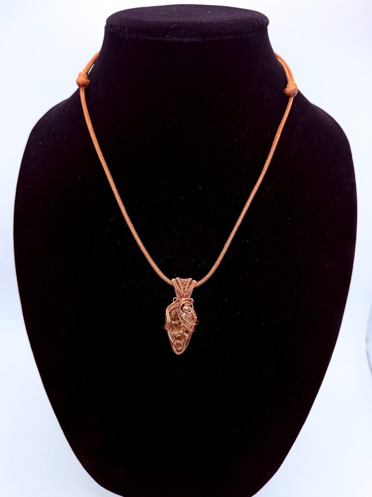 Photo of Earthen Spirit Wire Wrapped Aragonite Necklace on a neck form