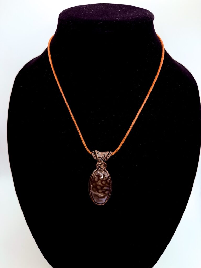 Radiant Energy Wire Wrapped Orbicular Agate Necklace 6 Photo of Radiant Energy Wire Wrapped Orbicular Agate Necklace on a neck form