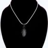 Photo of Mystic Strength Wire Wrapped Agate Necklace On an neck form