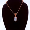 Photo of Serene Glow Wire Wrapped Opalite Necklace on a neck form