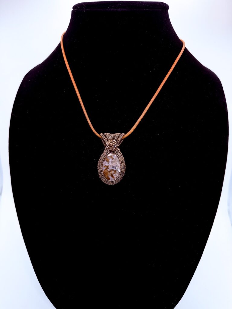 Rustic Spirit Wire Wrapped Brown Moss Agate Necklace 2 Photo of Rustic Spirit Wire Wrapped Brown Moss Agate Necklace on a neck form