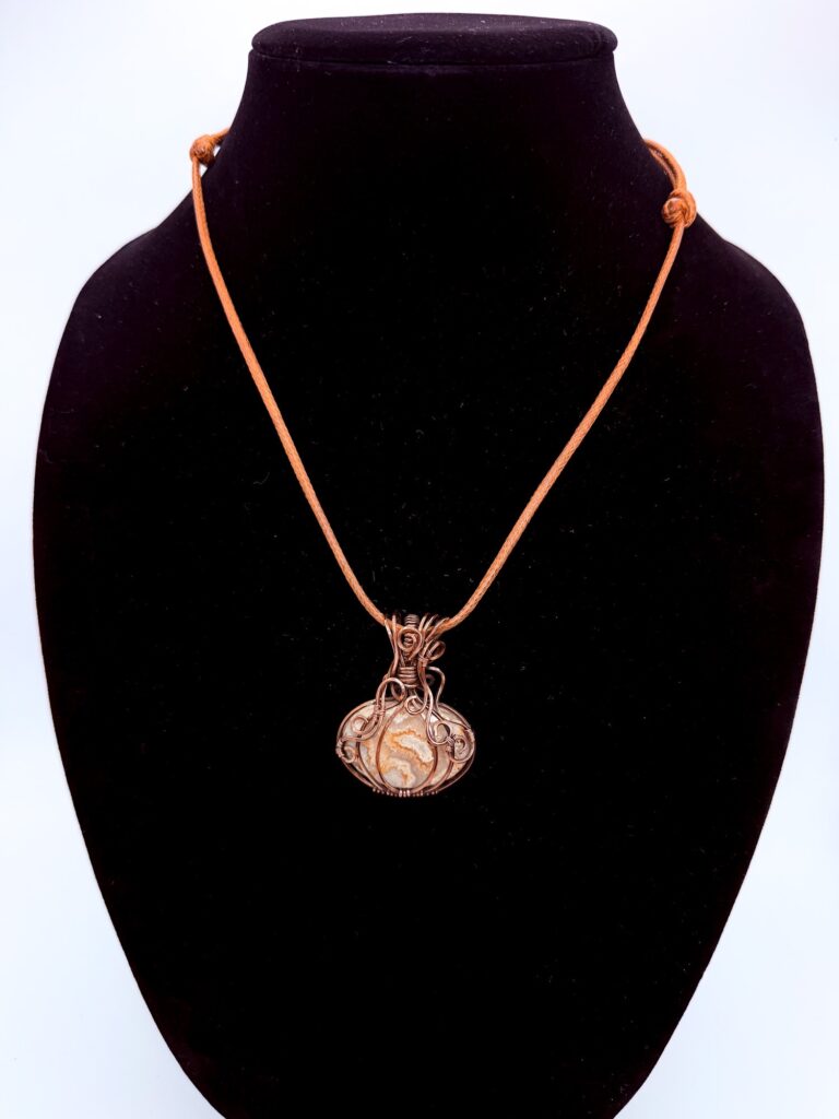 Transformative Magic Wire Wrapped Fossil Coral Necklace 2 Photo of Transformative Magic Wire Wrapped Fossil Coral Necklace on a neck form