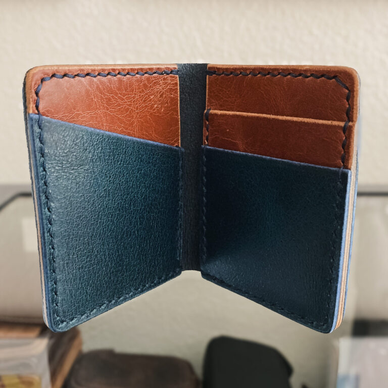 The Martin Slim Bifold – Hand-Stitched Blue & Tan Water Buffalo Leather 1 cropped IMG 2246 scaled 1