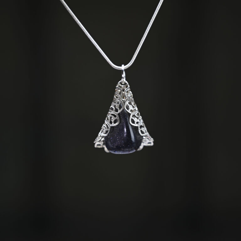 Blue Goldstone and silver filigree pendant