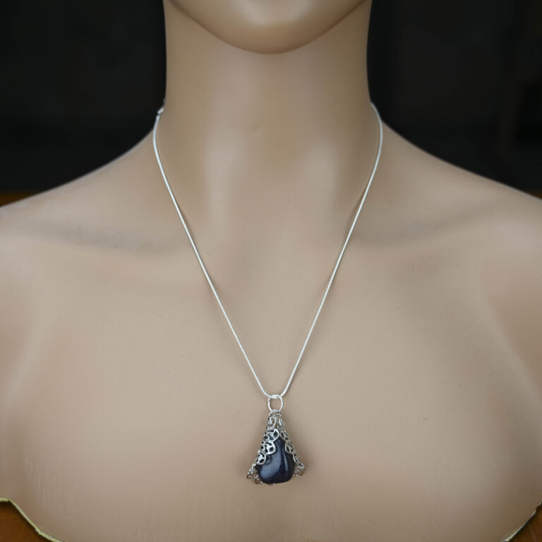 blue goldstone pendant on a silver chain