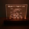 Illuminated etched ultrasound image with LED lighting with a variety of color choices.