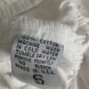 Eyelet top tag