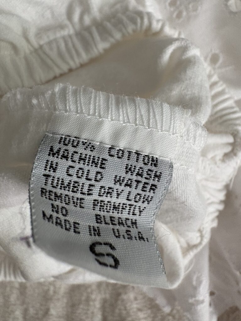 Eyelet top tag