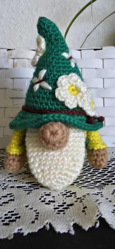 Enchanting 6 1/2-inch handcrafted gnome, decked out in the lively yellow and green of the Oregon State University Ducks