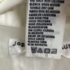 White crochet blouse fabric tag