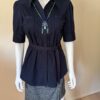 Navy blouse skort necklace