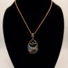 Photo of Celestial Dream Wire Wrapped Marcasite Aura Doublet Necklace on a Neck Form