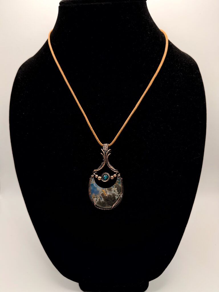 Photo of Celestial Dream Wire Wrapped Marcasite Aura Doublet Necklace on a Neck Form