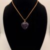 Image of Serene Heart Wire Wrapped Lepidolite Necklace. on a Neck Form