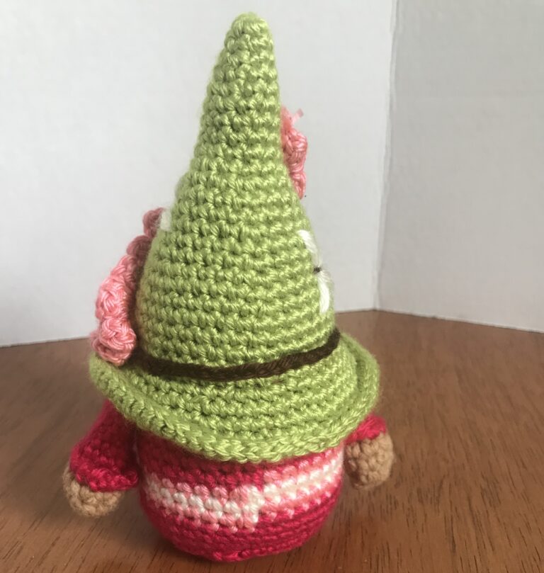 Handmade adorable rose-colored amigurumi gnome with pink flowers a whimsical gift 4 IMG 6074