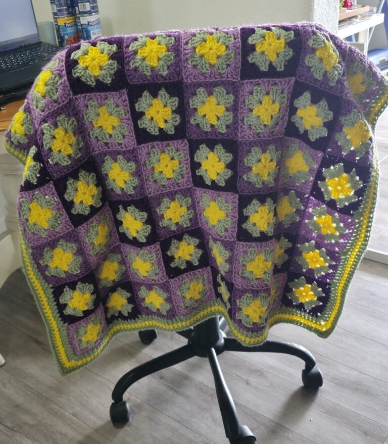 A lovingly handcrafted crochet baby lapghan blanket in enchanting shades of purple and green 2 purples crochet baby afghan full